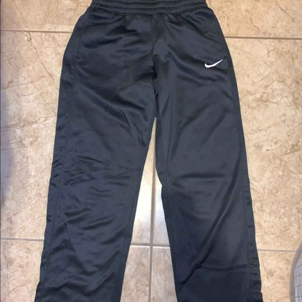 Dark grey Nike sweats